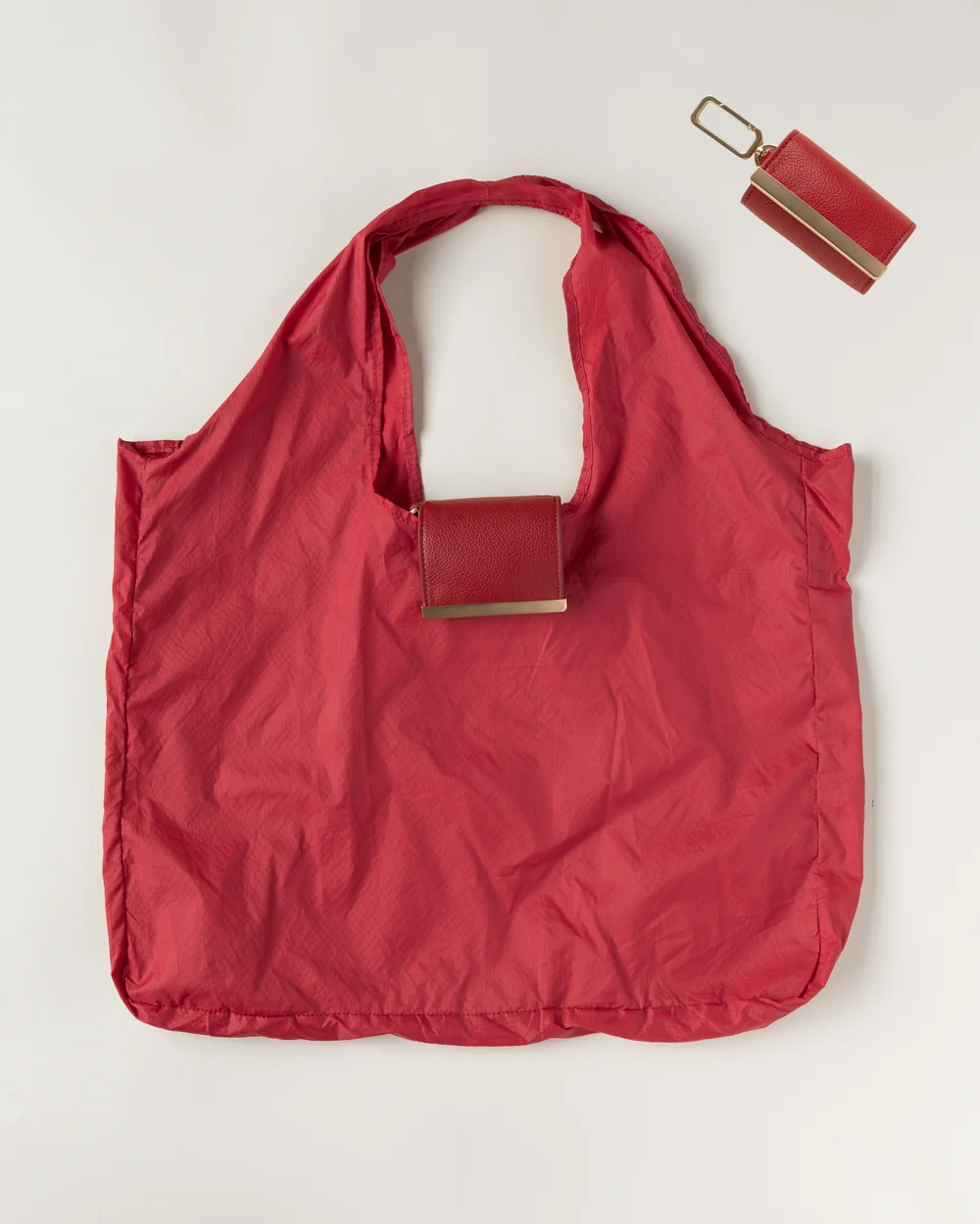 Llavero convertible en bolso de mano