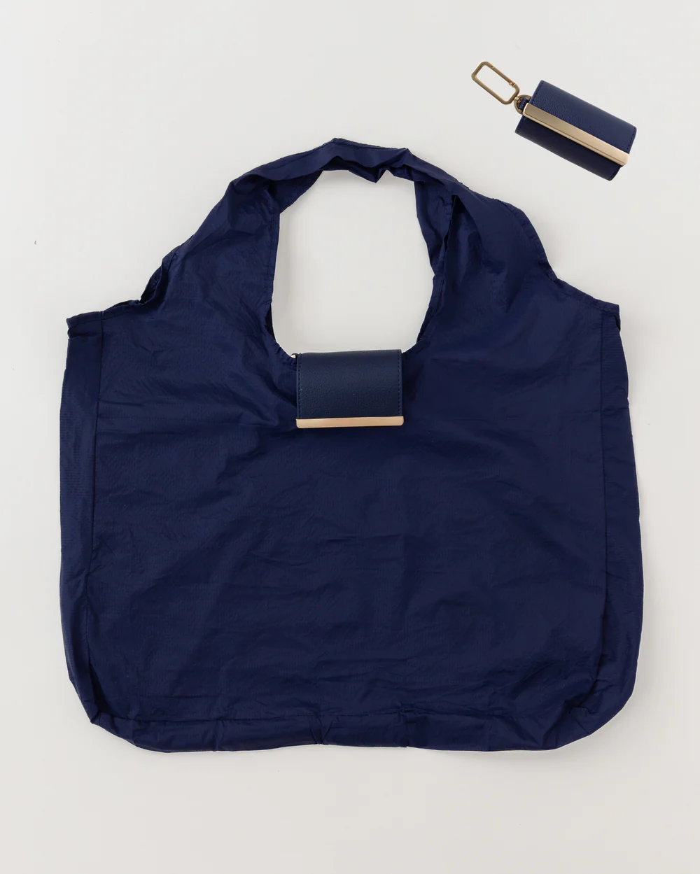 Llavero convertible en bolso de mano