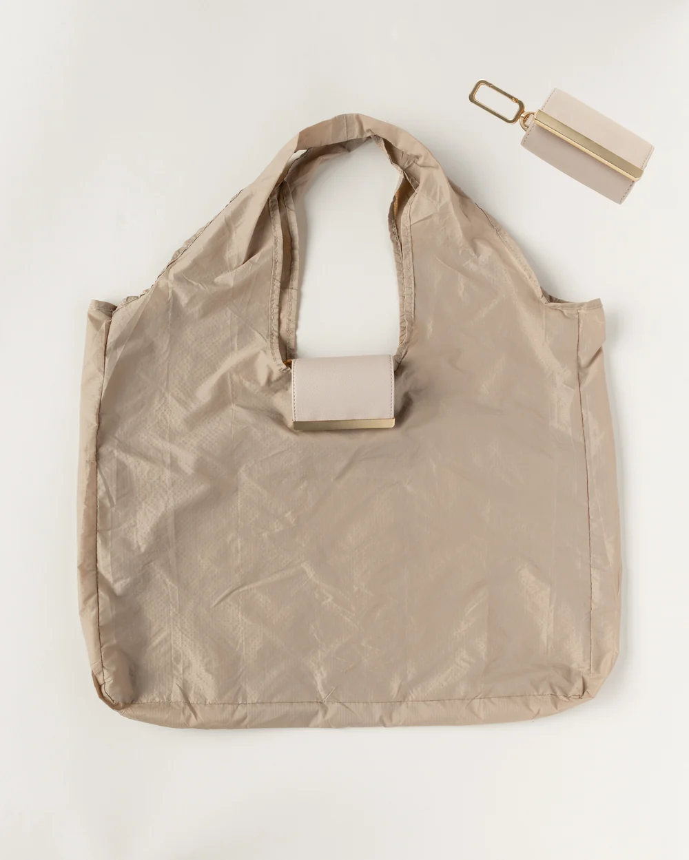 Llavero convertible en bolso de mano