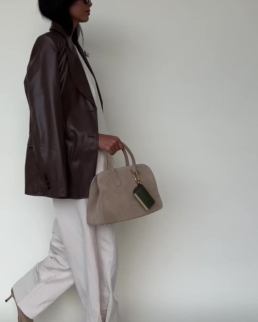 Llavero convertible en bolso de mano