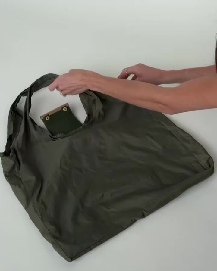 Llavero convertible en bolso de mano