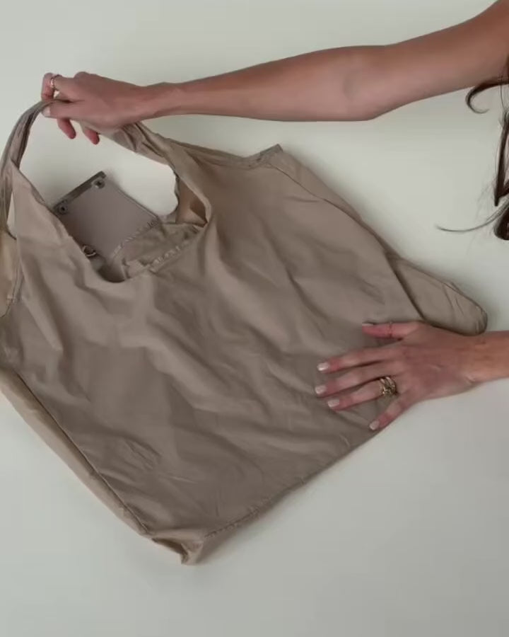 Llavero convertible en bolso de mano