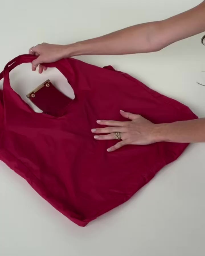 Llavero convertible en bolso de mano