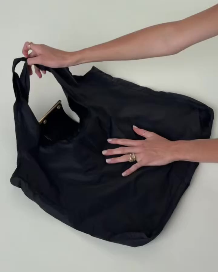 Llavero convertible en bolso de mano