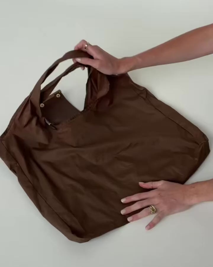 Llavero convertible en bolso de mano