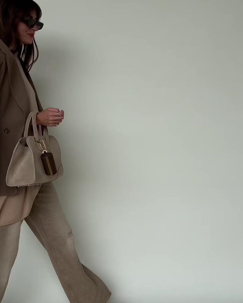 Llavero convertible en bolso de mano